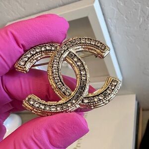 CHANEL Gold - Toned Brooch with Crystal Details